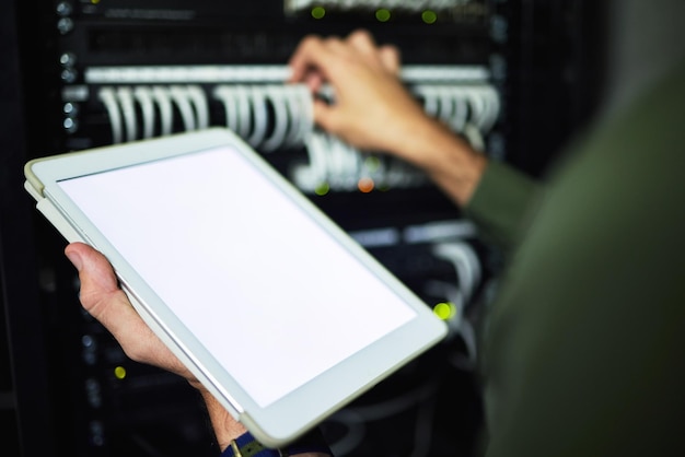 Screen server room and hands with a tablet for information network analytics or maintenance Closeup working and a programmer with blank technology for system connectivity coding or support