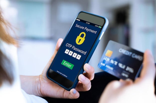 Secure payment OTP PASSWORD CONCEPTfemale hands using mobile phone and holding credit card