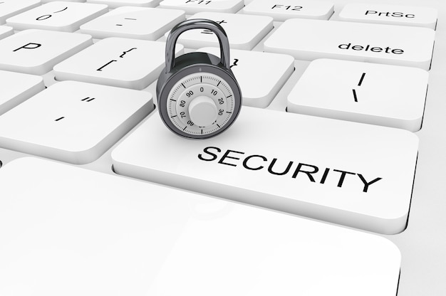 Security concept. Extreme closeup chrome padlock on a keyboard