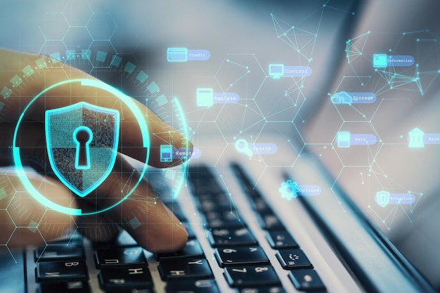 side view and close up of hand using laptop with creative digital padlock interface on blurry background safety protection virtual information and security concept double exposure