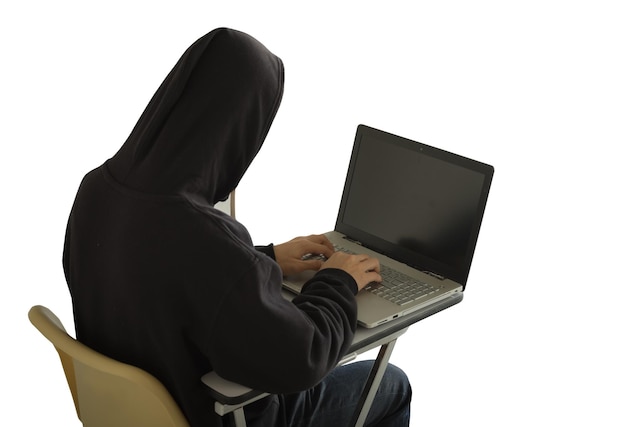 Side view of man using laptop against white background