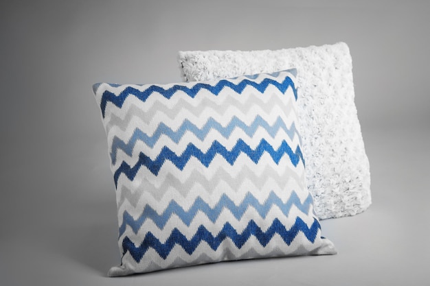 Soft pillows on light background