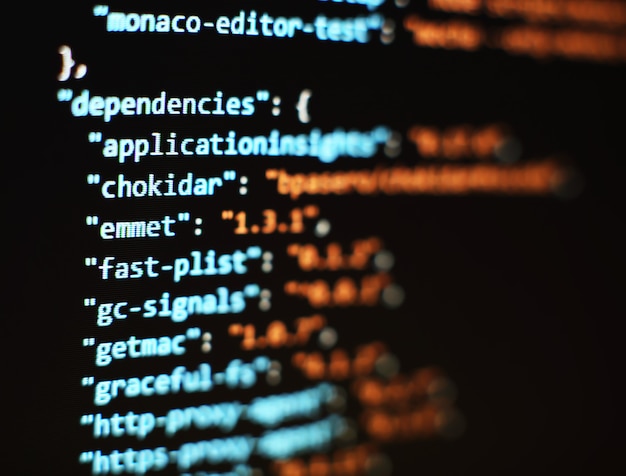Software developer programming code. Abstract computer script code. Selective focus