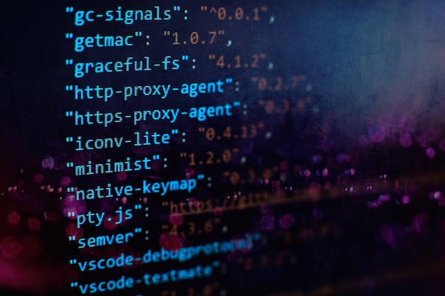 Software developer programming code. Abstract computer script code. Selective focus