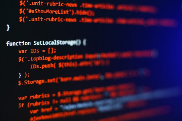 Software developer programming code. Abstract computer script code. Selective focus
