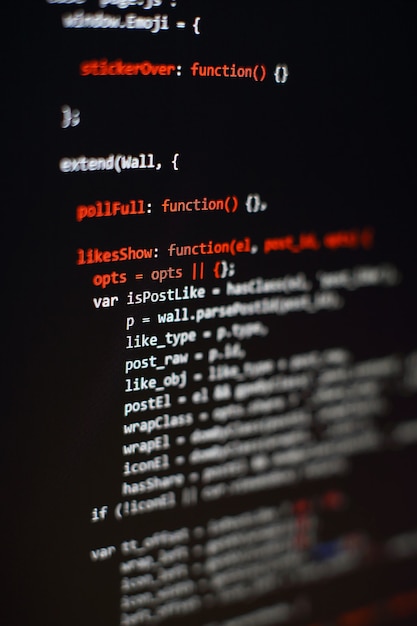 Software developer programming code. Abstract computer script code. Selective focus