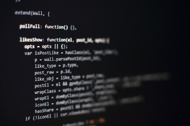 Software developer programming code. Abstract computer script code. Selective focus