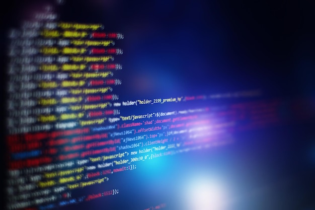 Software developer programming code. Abstract computer script code. Selective focus