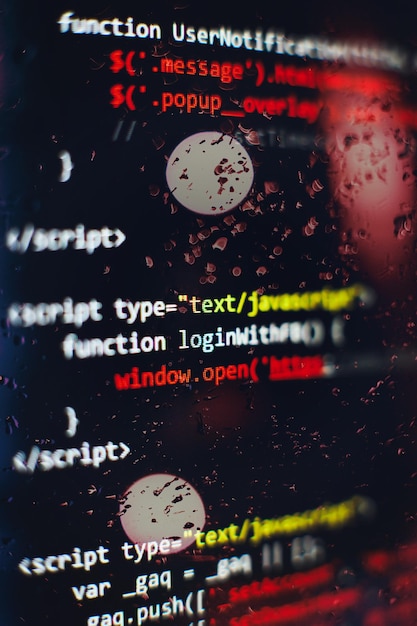 Software developer programming code. Abstract computer script code. Selective focus