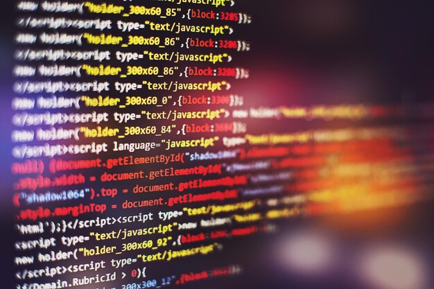 Software developer programming code. Abstract computer script code. Selective focus