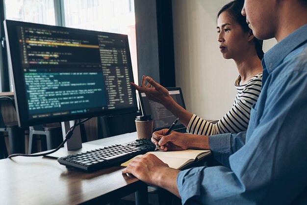 Software developers working at office