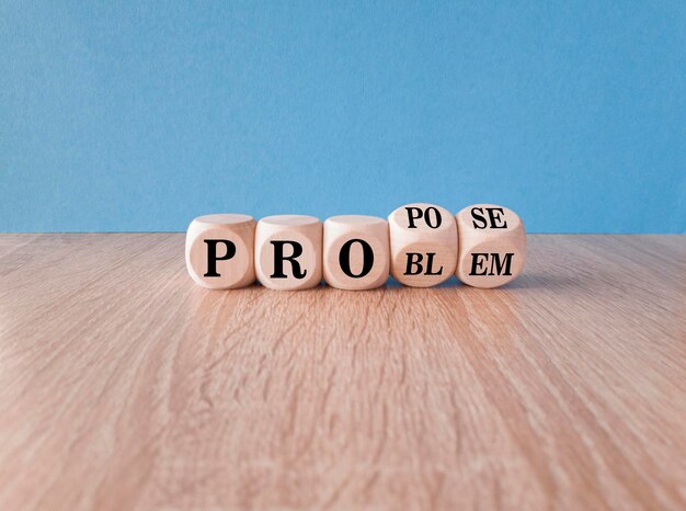 Solving a problem and propose symbol Turned wooden cubes changes the word problem to propose