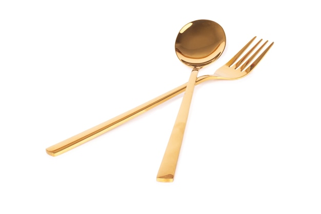 Spoon fork brass gold isolated on white background.