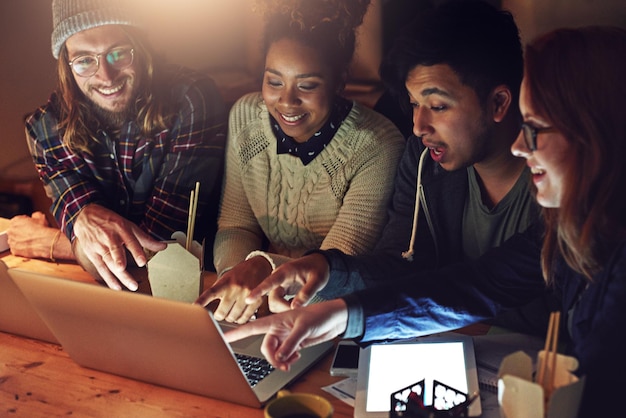 Startup business laptop and people pointing at web design code cloud computing software or wow app Website SEO team media content diversity or night teamwork collaboration on UX interface system