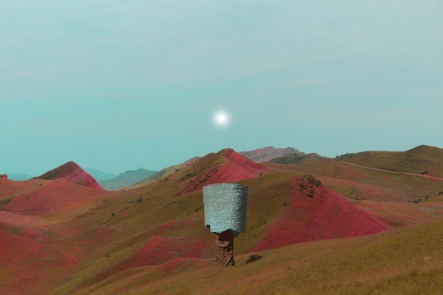 structures on rolling landscape against blue sky
