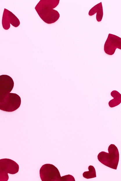 Stylish valentine hearts flat lay on pink paper space for text Valentines day card template Love