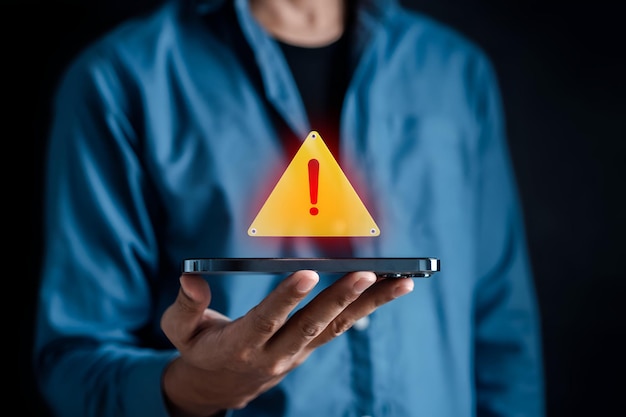 System warning caution sign symbol paper cut out Notification error and maintenance concept cyber attack on computer network Cybersecurity vulnerability data breach