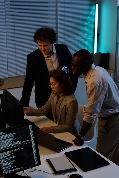 team of programmers developing new program