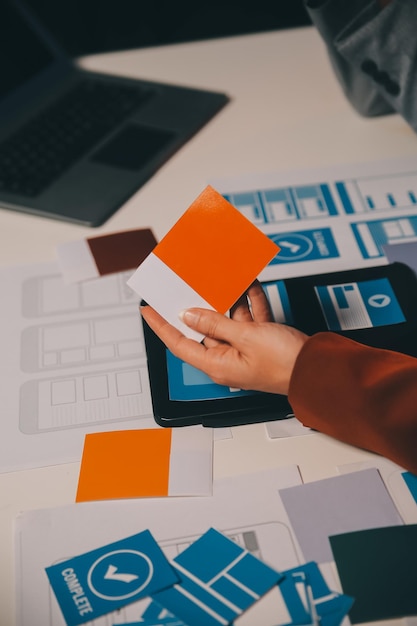 team of ui ux web designer are working together to develop mobile responsive websites mobile mockup