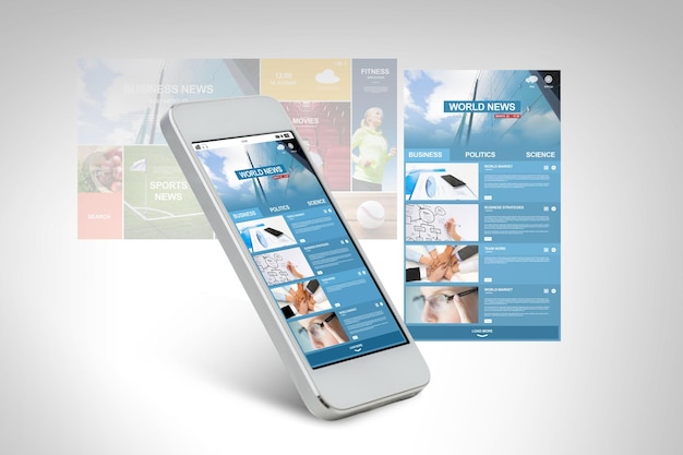 teknologi, forretning, elektronik, internet og massemediekoncept - hvid smartphone med verdensnyheder webside på skærmen