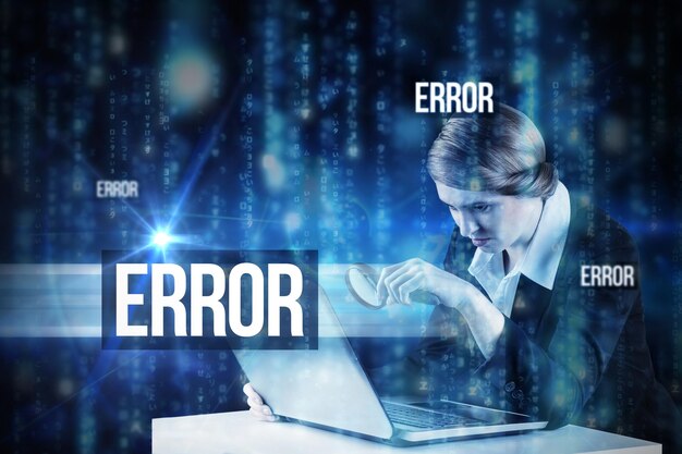 The word error and redhead businesswoman using her laptop against lines of blue blurred letters falling