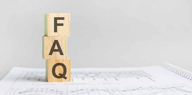 the word faq structured query language, lined with wooden blocks