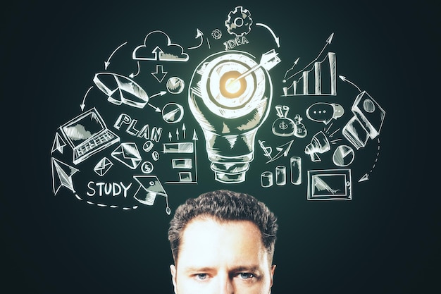 Thinking businessman with drawing business sketch