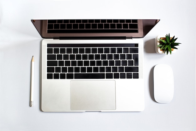 Top view of a desk with office supplies