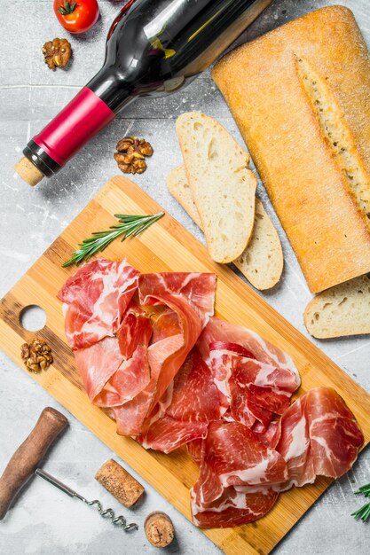Traditional Spanish ham with ciabatta and red wine