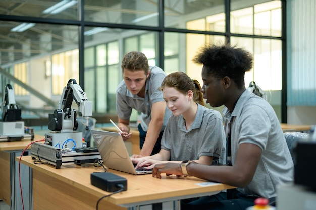 Trainee Robotics engineer learning with Programming and Manipulating Robot Hand