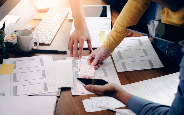 UI creative designer team designing layout smartphone interface