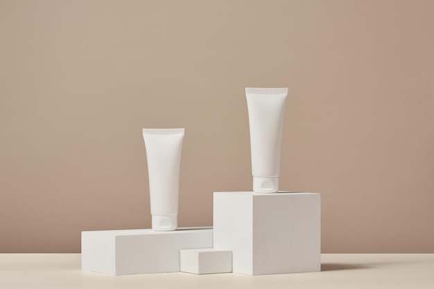 Unbranded blank cosmetics packages on a pedestal Skincare female products