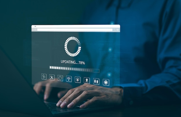 Update software application and hardware upgrade technology concept User is using laptop software update or operating system upgrade updating progress bar on computer screen Install app patch