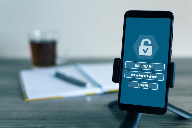 Username and password to login on cell phone screen cyber security concept Data protection