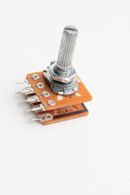 Variable resistor potentiometer on isolated white background