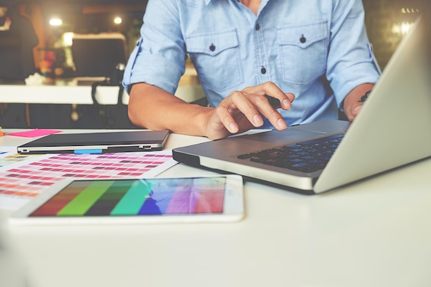 View of man using laptop