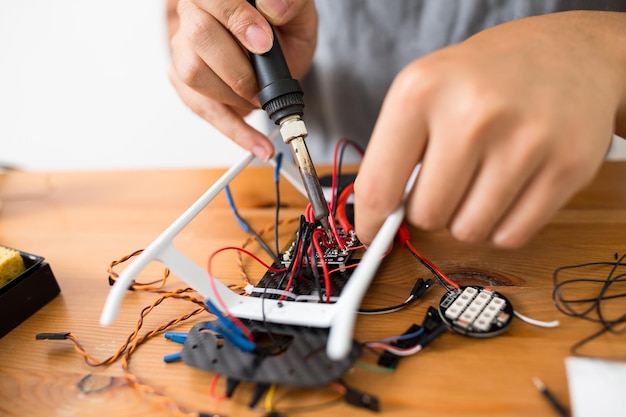 Welding the cable on drone at home
