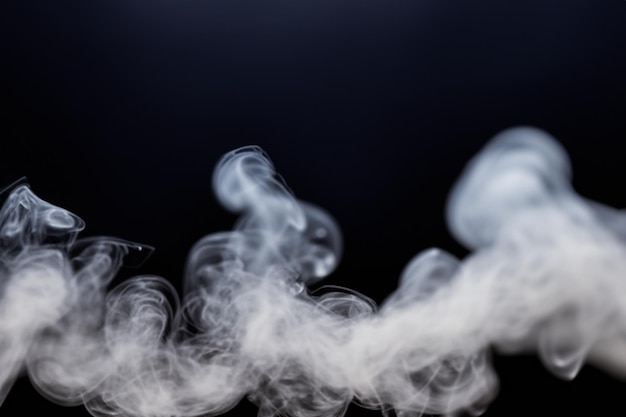 White smoke fragments on black background