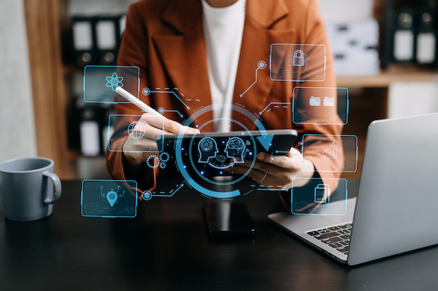 Woman using chatbot in computer and tablet smart intelligence AiChat with AI Artificial Intelligence developed by OpenAI generate Futuristic technology robot in online systemxA