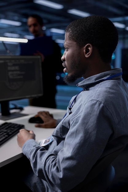 Worker looking for errors causing hardware to slow down