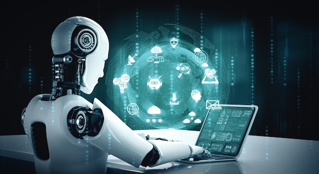 XAI Robot humanoid use laptop and sit at table for global network connection