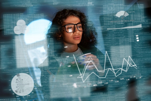 Young woman is thinking about the statistics and graphics.
