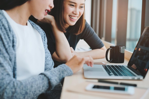 Young women using laptop