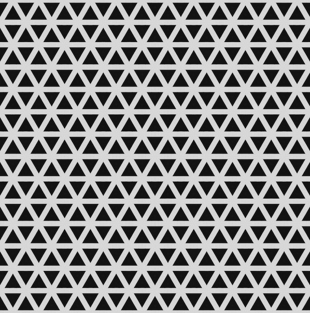 a black and white pattern with triangles.