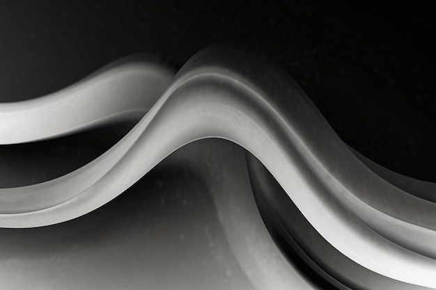 a black and white photo of a swirl of white smoke