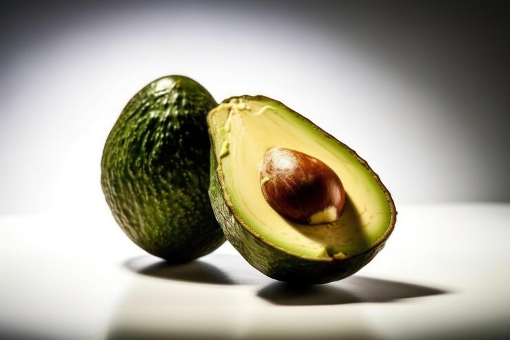 A close up of an avocado with the word avocado on the side