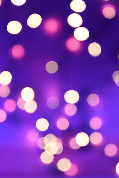 Abstract blurred purple background with bokeh defocused