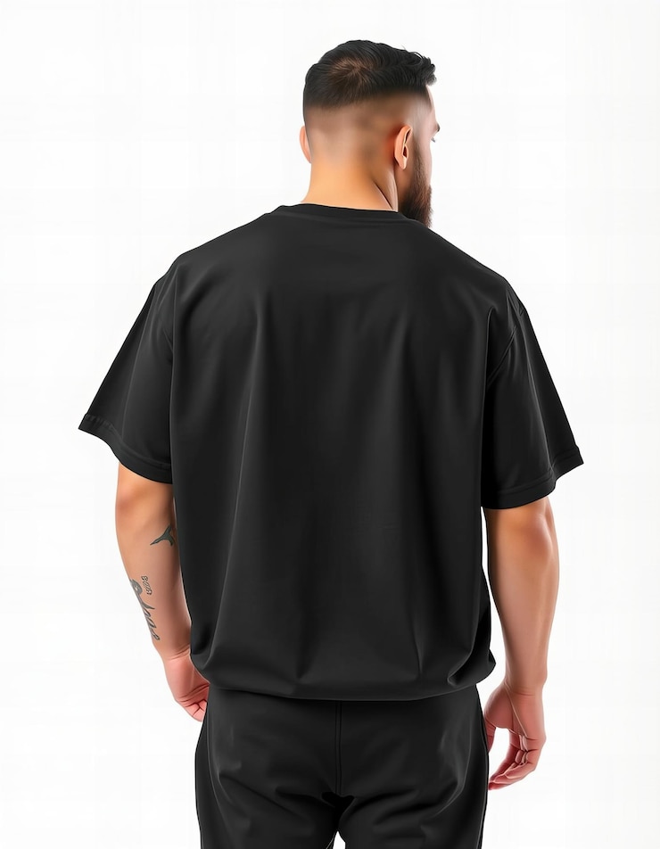 Black oversized tshirt mockup back view of a man wearing black sweatpants
