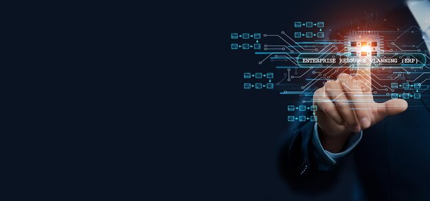 Businessman hand touching virtual graphical interface of Enterprise Resource Planning ERP solution