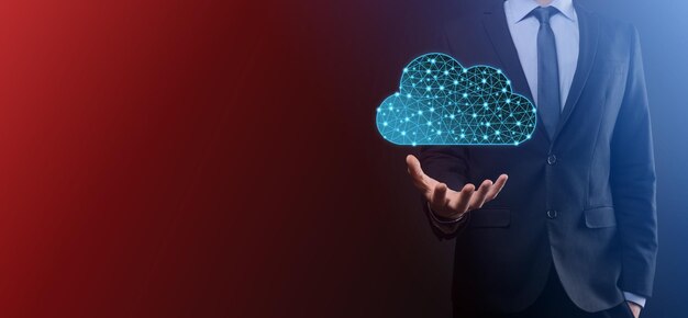 Businessman hold cloud icon.Cloud computing concept - connect smart phone to cloud. computing network information technologist with smart phone.Big data Concept.Low poly,polygonal.